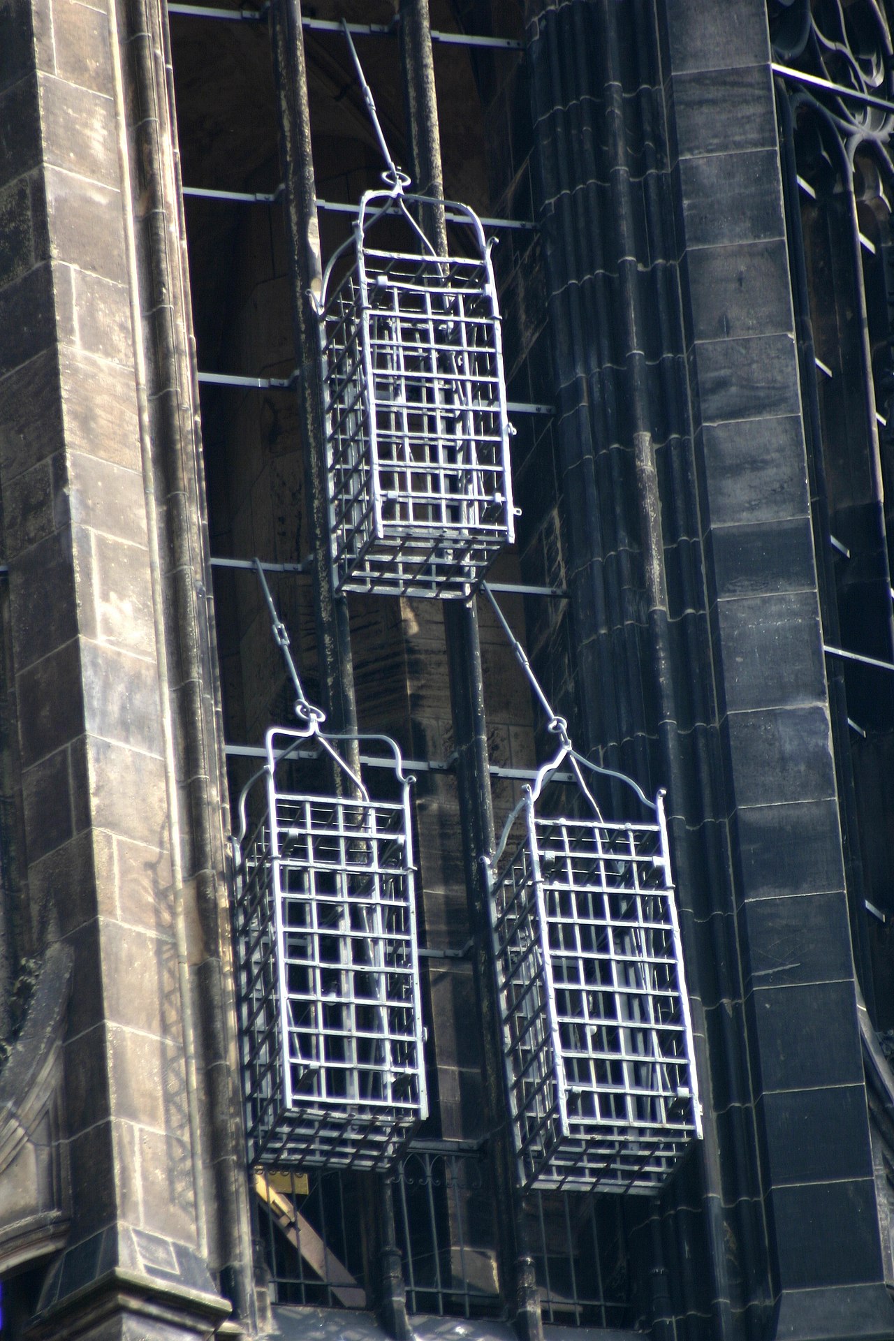 The cages at the Lamberti Church in Münster, in which the leaders' corpses were displayed as a deterrent. Basically helicopters before they were cool.